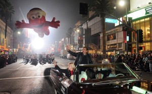 The 81st annual Hollywood Christmas Parade began Sunday night November 26, 2012 at 6:30 p.m. for a 3.2-mile route down Hollywood Boulevard, Vine Street and back along Sunset Boulevard.  Cirque du Soleil characters from IRIS were part of the broadcast.  Actor Joe Mantegna served as grand marshal for the parade as a balloon of Elmo floats behind him.   (Dean Musgrove/ Staff Photographer)