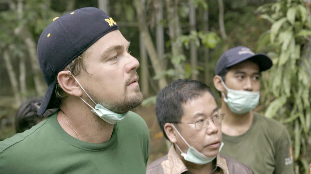 INDONESIA- Leonardo with Orangutans in the Leuser Ecosystem. For two years, Leonardo DiCaprio has criss-crossed the planet in his role as UN messenger of Peace on Climate Change. This film, executive produced by Brett Ratner and Martin Scorsese, follows that journey to find both the crisis points and the solutions to this existential threat to human species.  © 2016 RatPac Documentary Films, LLC and Greenhour Corporation, Inc. All rights reserved.