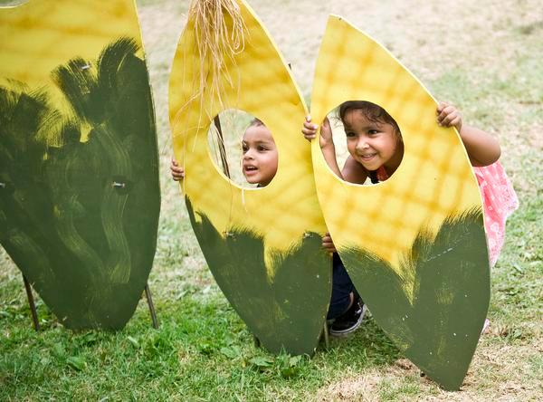 Matthew Gaitan, 2, and Destiny Alvarado, 3, play around wooden ears of corn at the annual La Habra Corn Festival.

///ADDITIONAL INFORMATION: 0808.spr.corn Ð 8/2/14 Ð NICK AGRO, ORANGE COUNTY REGISTER
 The La Habra Corn Festival is the biggest event in the city. The doggy costume contest begins at 2:30 p.m., with registration at 1:30 p.m. The corn eating contest begins at 2 p.m.