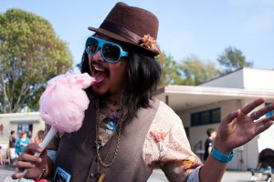 Mista Cookie Jar enjoying cotton candy at school fair enjoying - photo by Catherine Manzella Photography