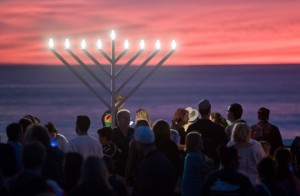 Local residents enjoy a beautiful sunset at the end of the San Clemente Pier on Sunday, December 10, 2017 during Chabad San Clemente's annual Menorah lighting ceremony at pre-Chanukah celebration. (Photo By Jeff Antenore, Contributing Photographer)